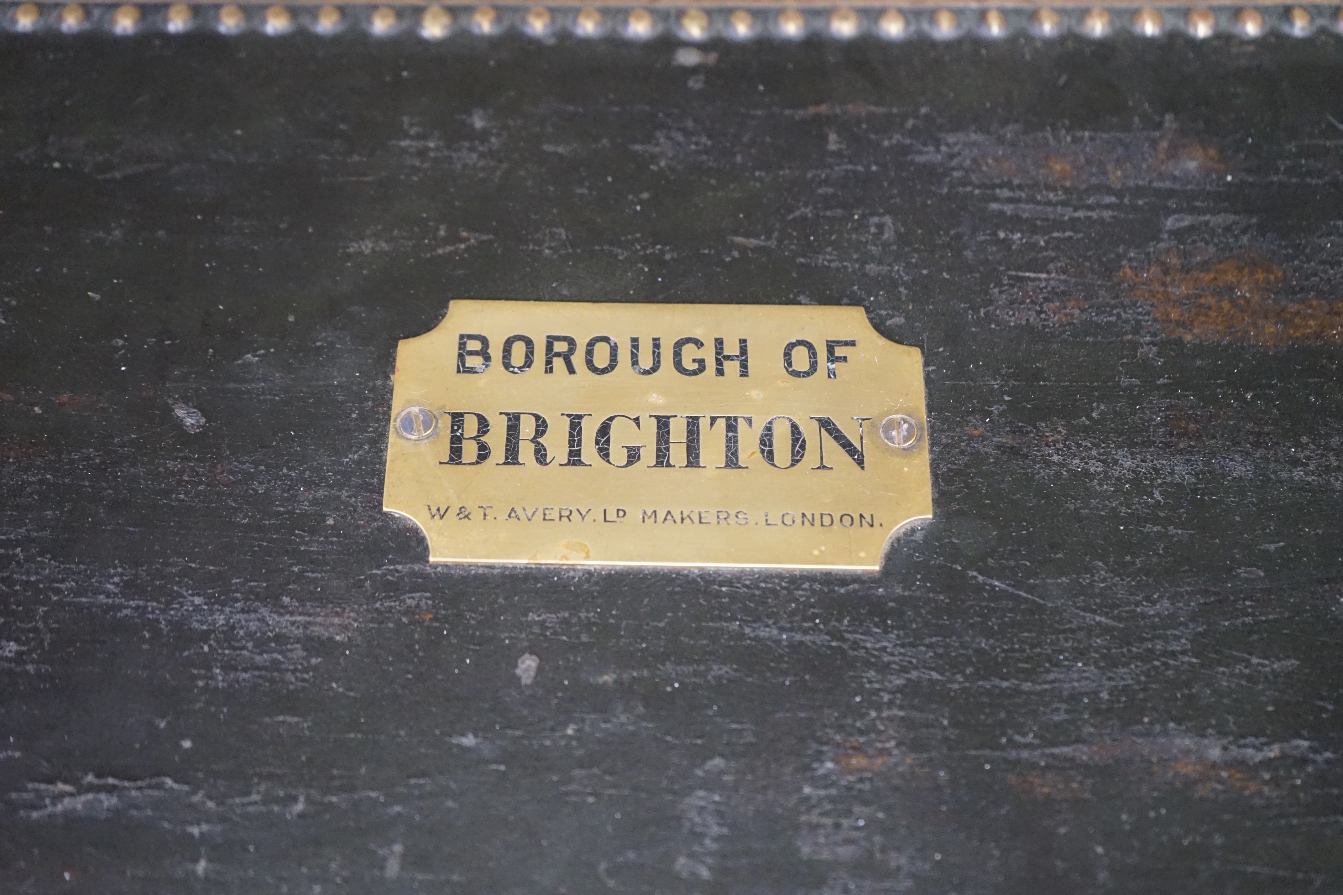 A 19th century leather and brass bound trunk with Avery Ltd applied brass plaque; 'Borough of Brighton', 54cm x 26.5cm x 22cm